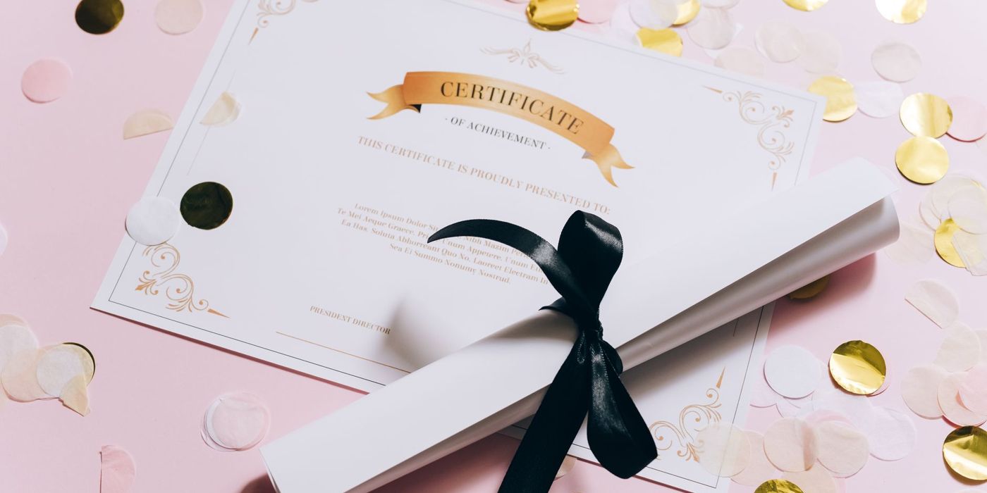 An accreditation certificate with a ribboned scroll