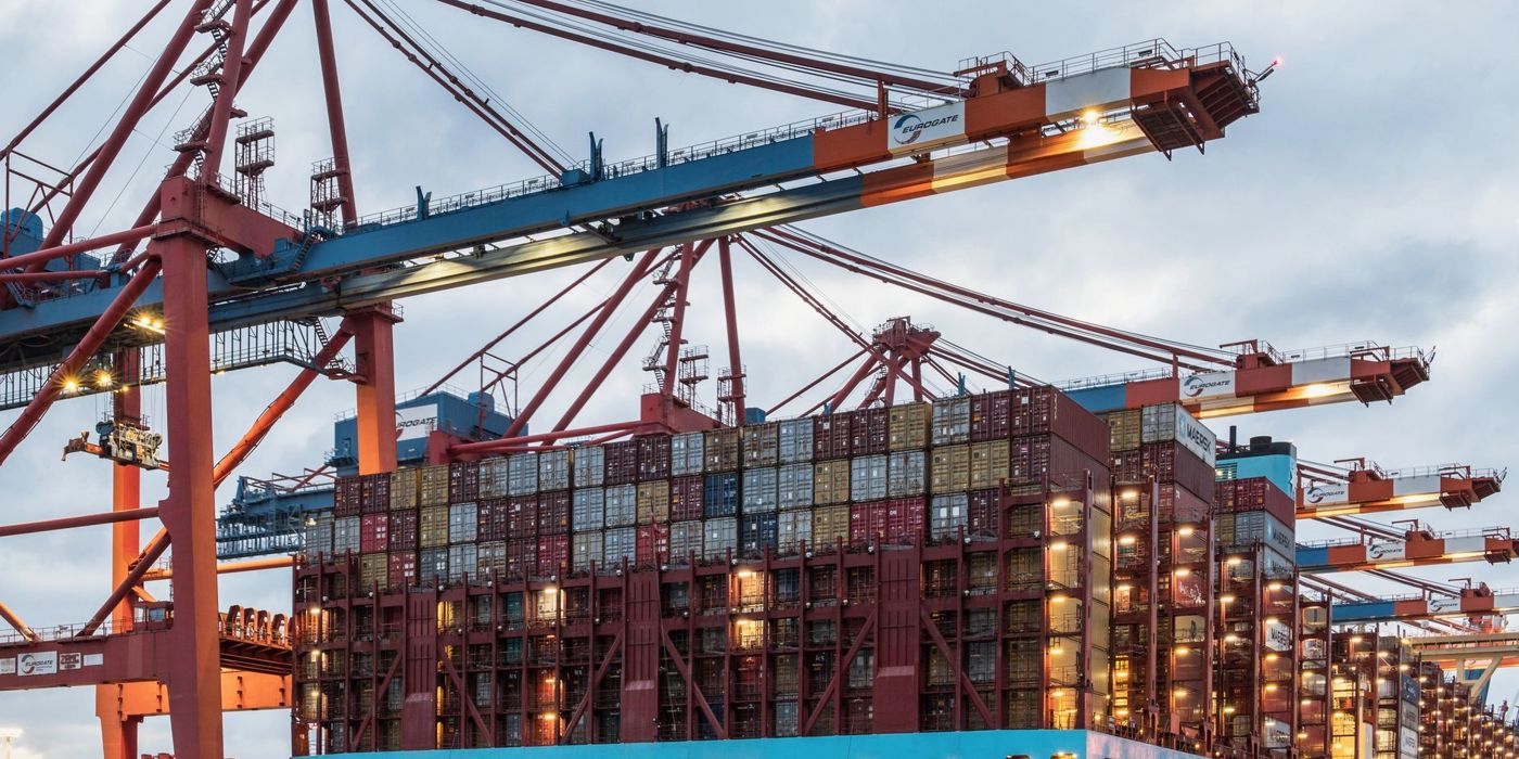 A container ship being loaded for export at a port