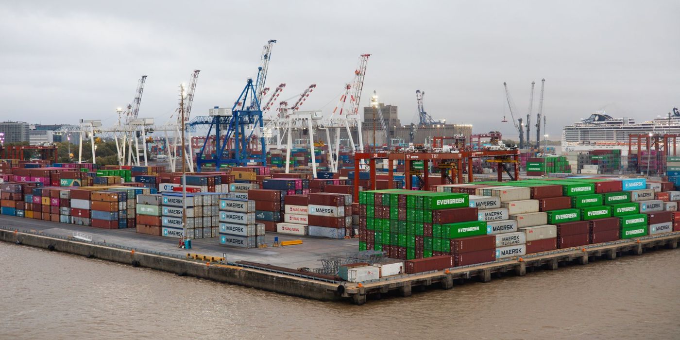 A busy container port handling imported goods